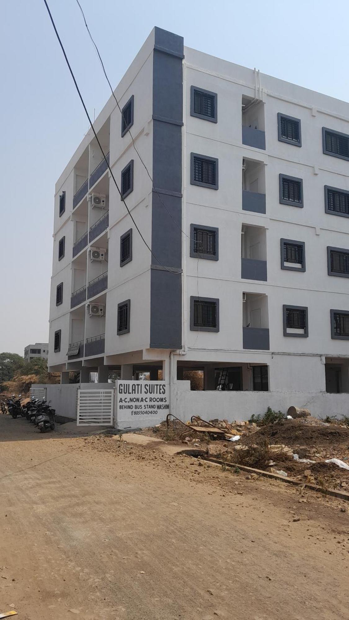 Hotel Gulati Suites Washim Bagian luar foto